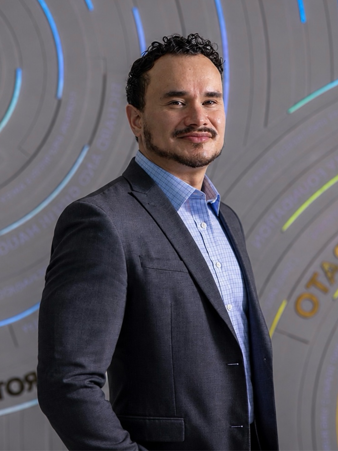 Guadalupe Hayes-Mota in a navy blazer and blue shirt